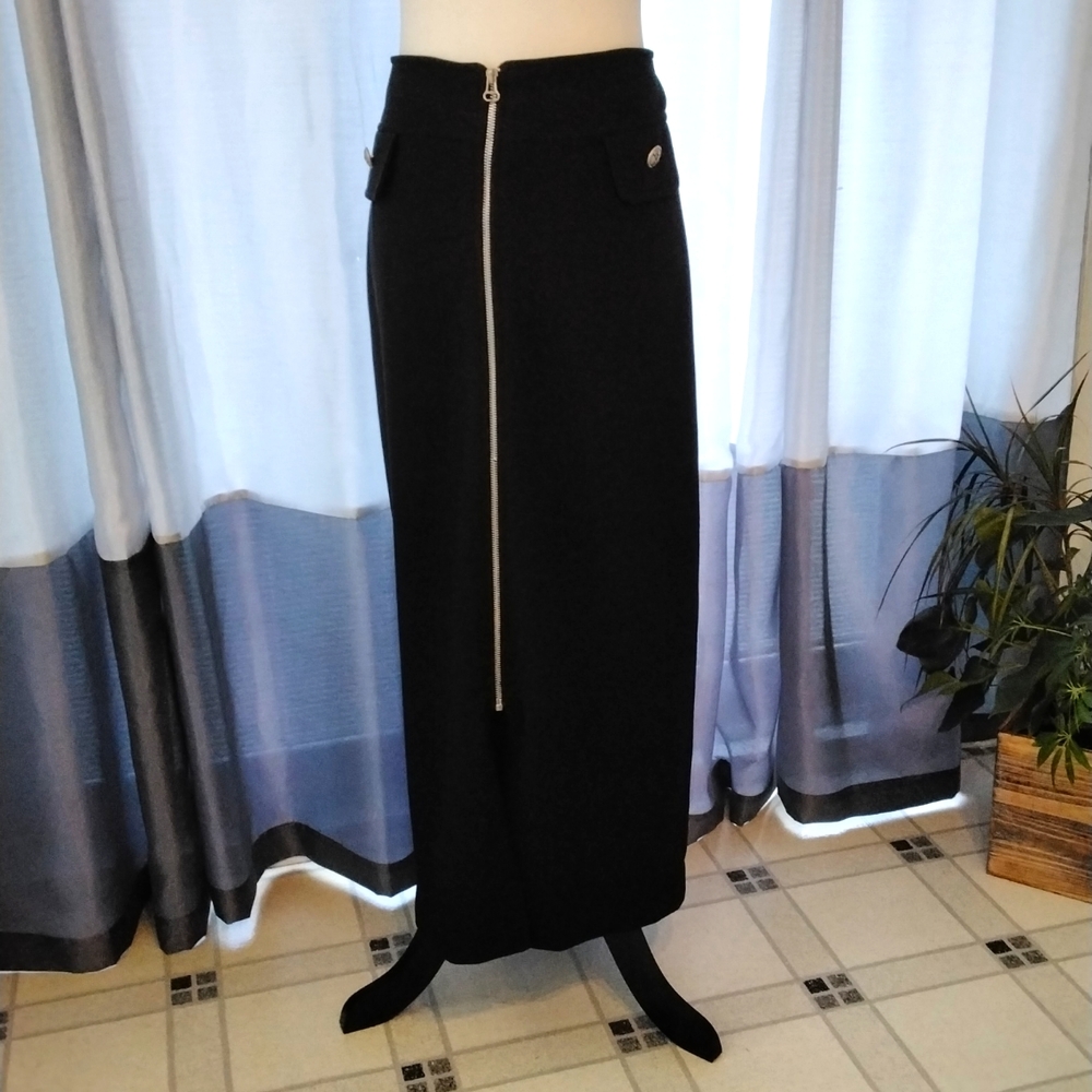 Ladies black zippered skirt with button detail